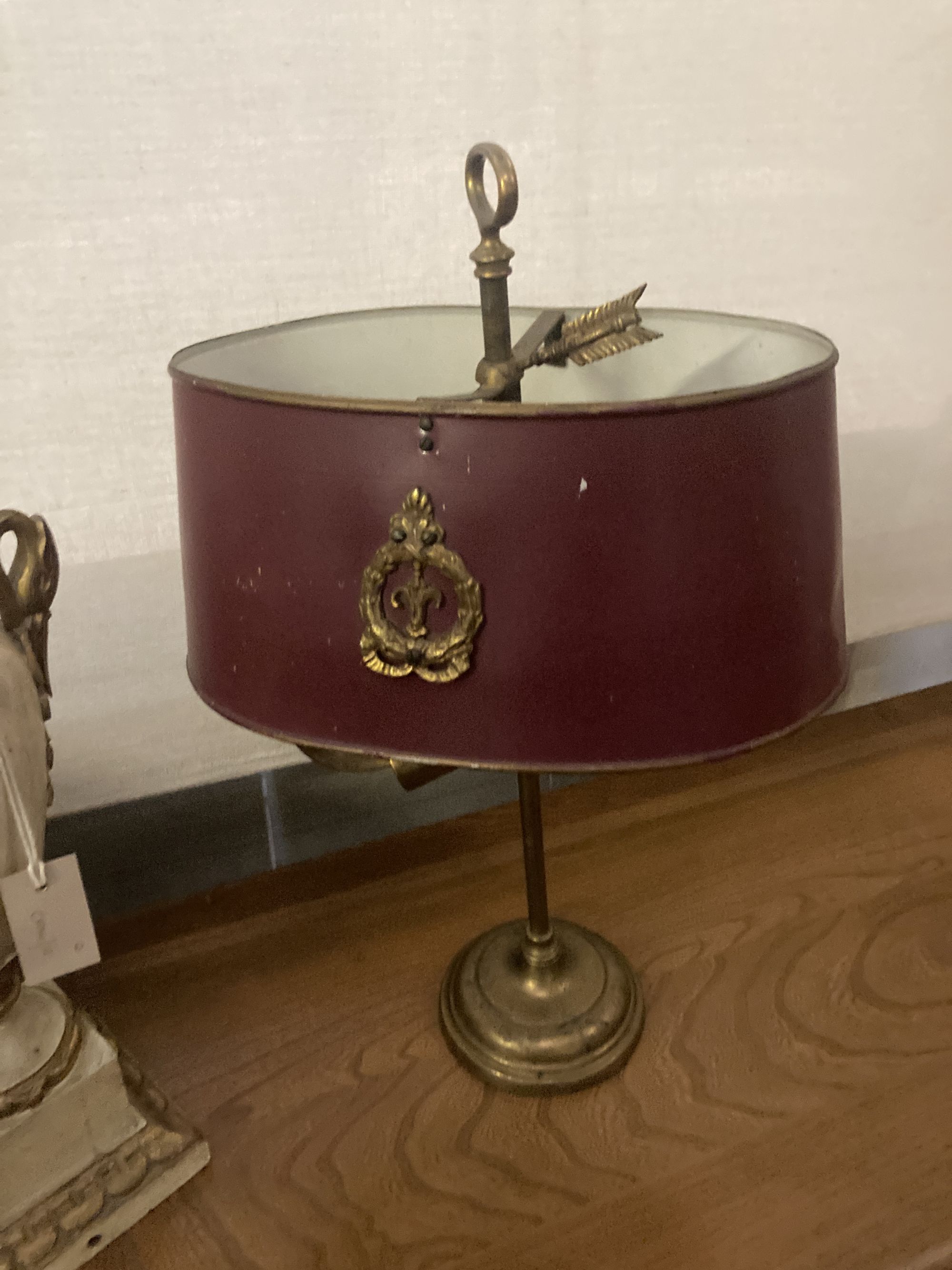 A brass table lamp with toleware shade, height 56cm, together with a parcel gilt painted wood table lamp